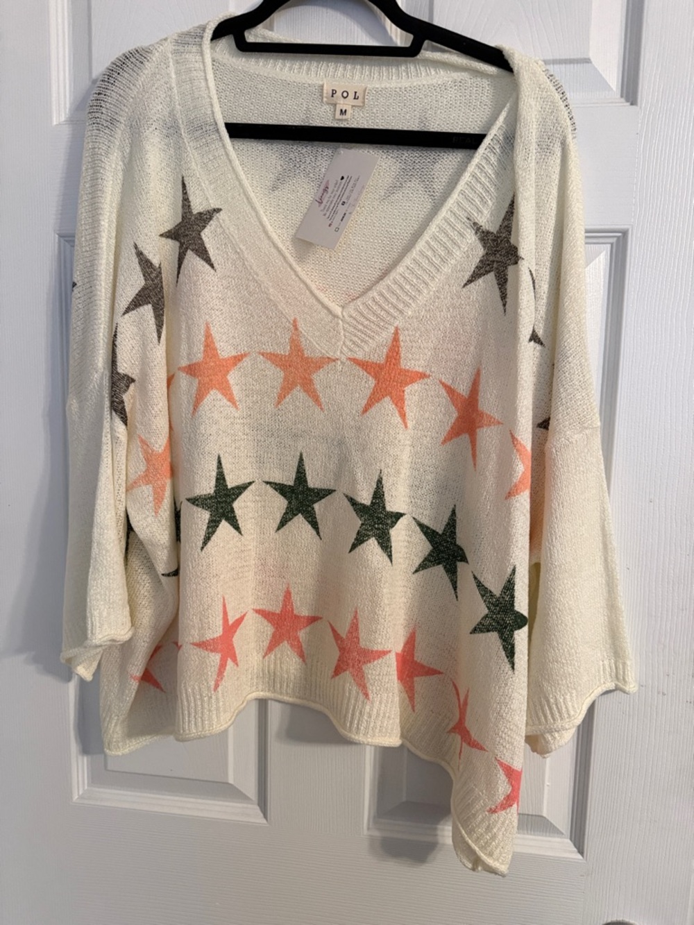POL Women's oversized V-Neck Star Sweater in Cream with Pink & Green Stars